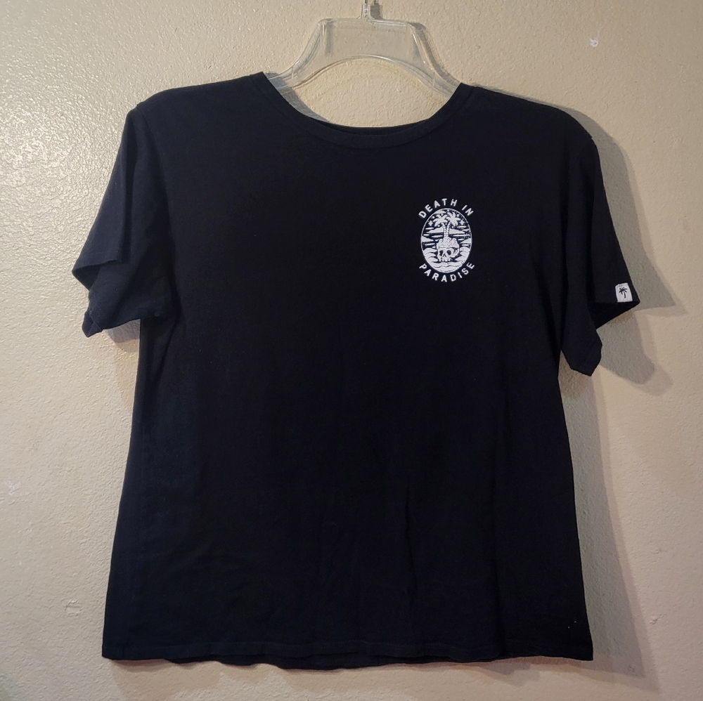 Black and white skeleton graphic shirt.